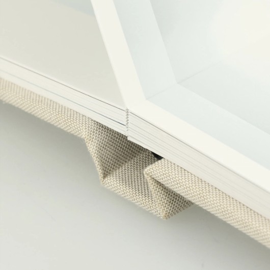 Premium à couverture rigide avec reliure à plat et pages épaissies